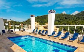 Apartamentos 300m Praia das Toninhas - vista para a serra do mar